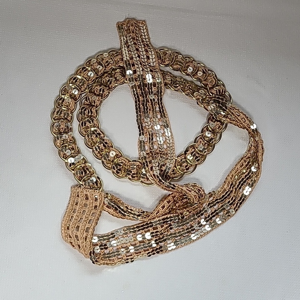 Vintage belt, gold rings, open weave fabric, sequins galore!  Glam!!